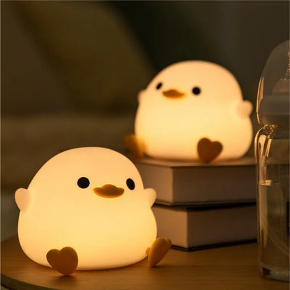 QuackGlow veilleuse canard bebe detail texture silicone — Velours Bébé
